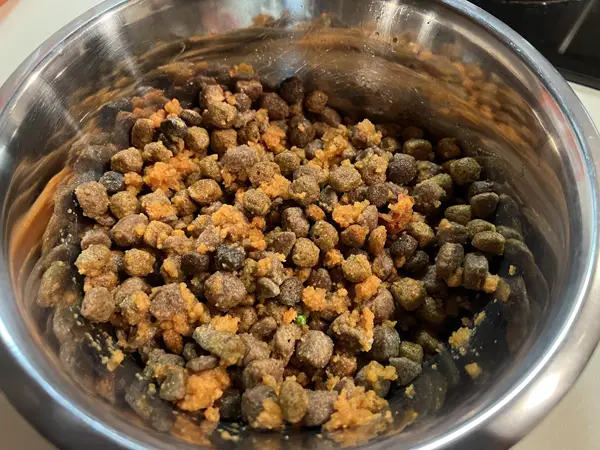 Mixing Olewo carrots with dog food part 4